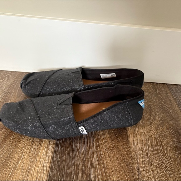 TOMS Black Glitter Slip-On Shoes. 
9w - Picture 2 of 7